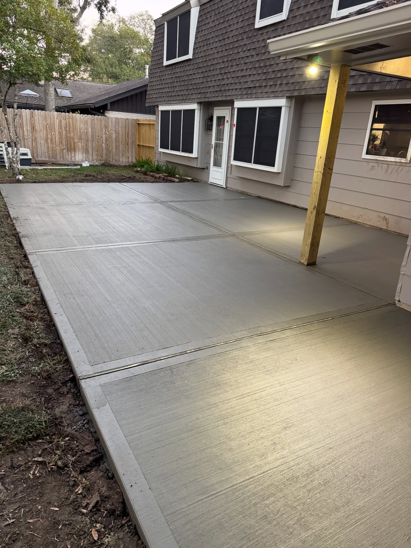 Durable concrete driveway installed by Castanon Concrete Designs in Houston, TX"