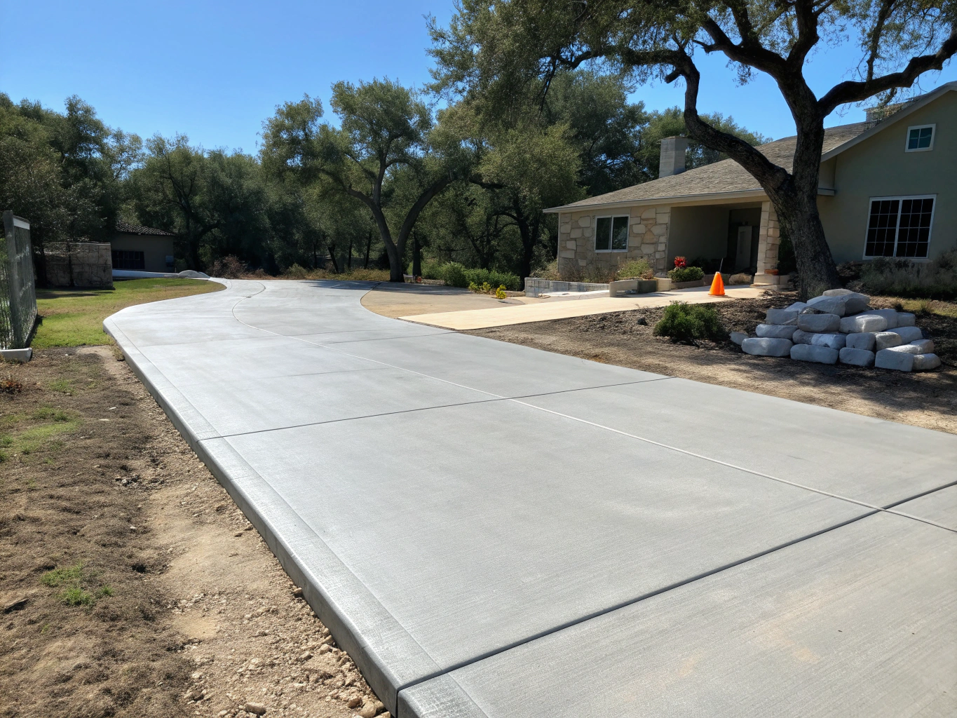 Poured reinforced concrete driveway for a residential property in Rosharon